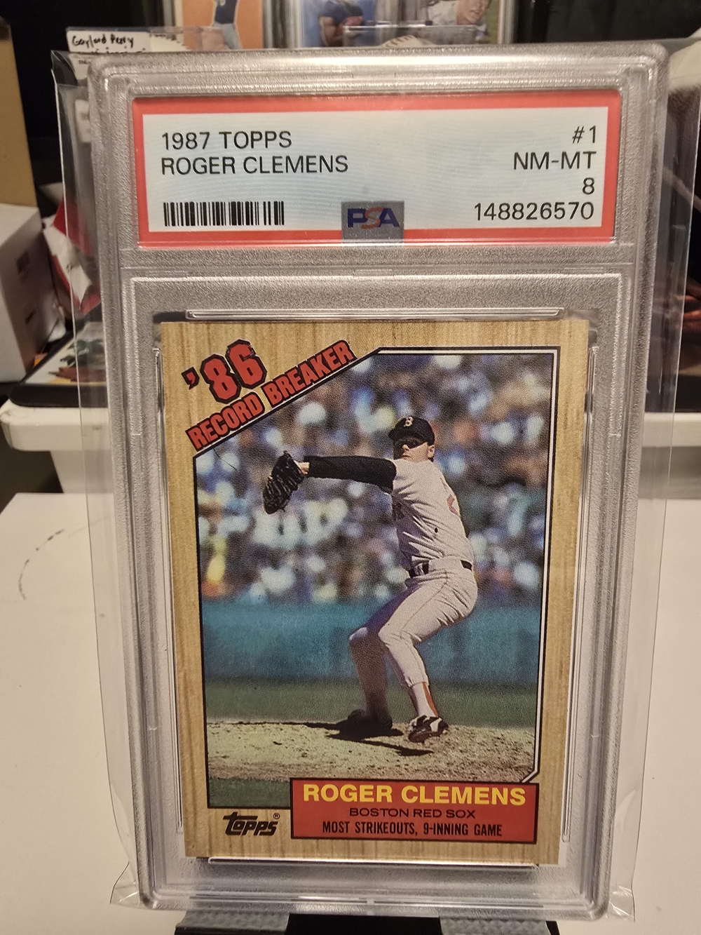 Topps Baseball Card with Red Accents - Roger Clemens TRIPLE ERROR CARD PSA 8